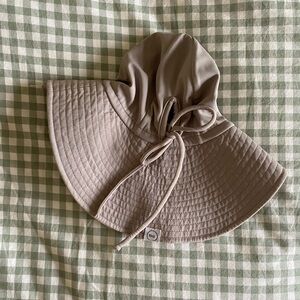 Fini. The label Sun Hat 1-3 years. Colour mushroom